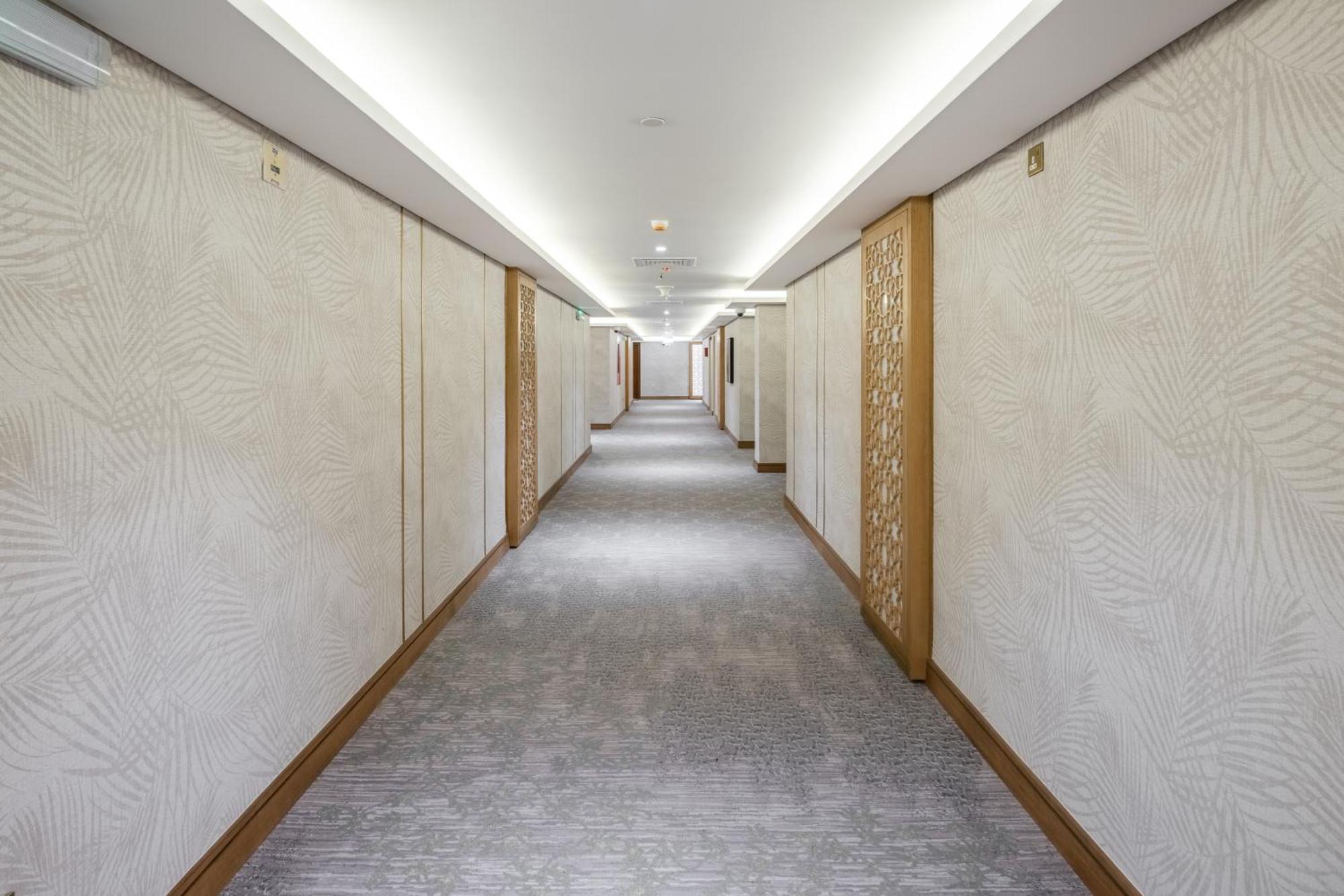 Taiba Suites Madinah Medina Exterior photo A corridor at the hotel