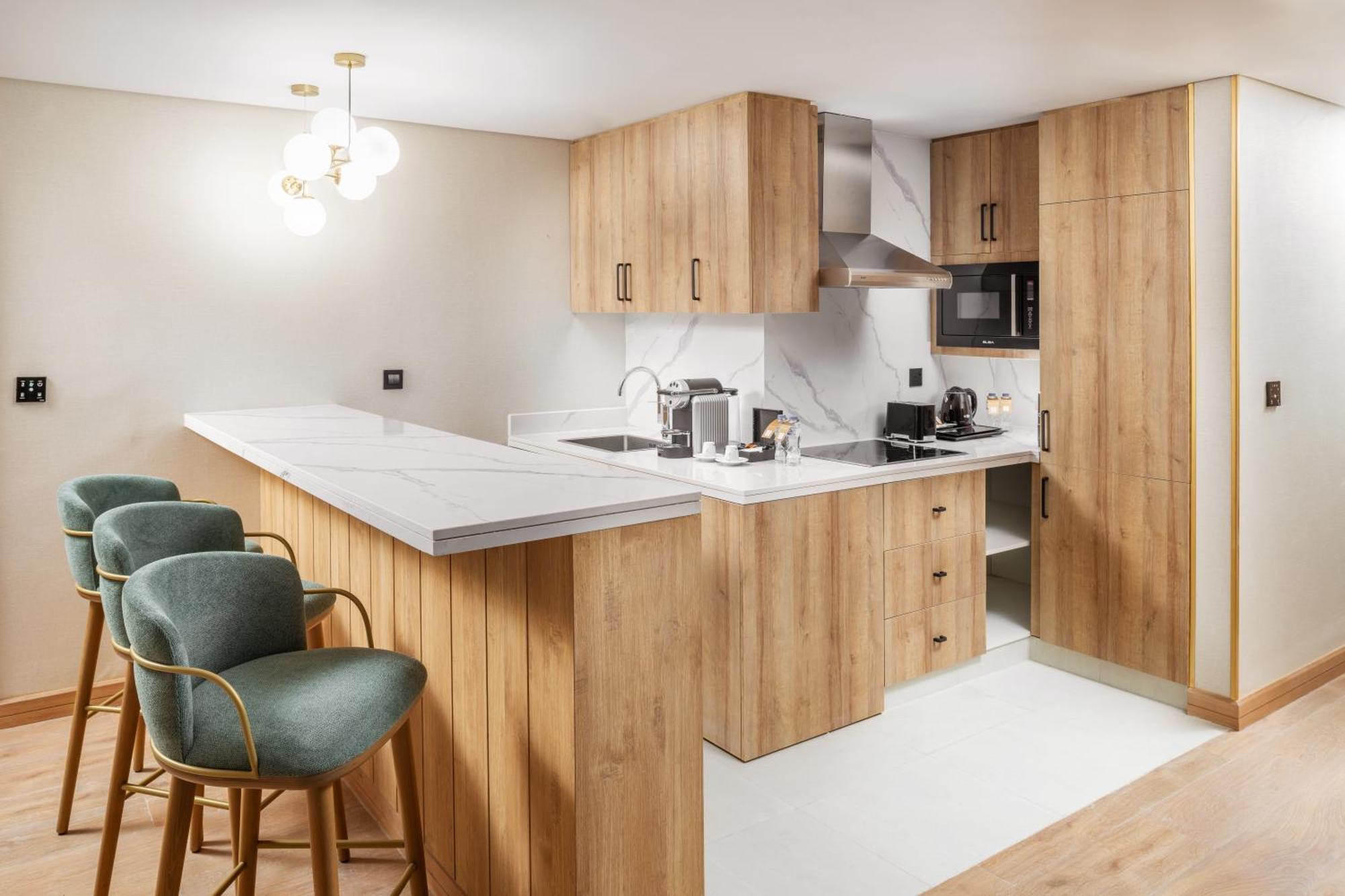 Taiba Suites Madinah Medina Exterior photo A kitchen in a serviced apartment